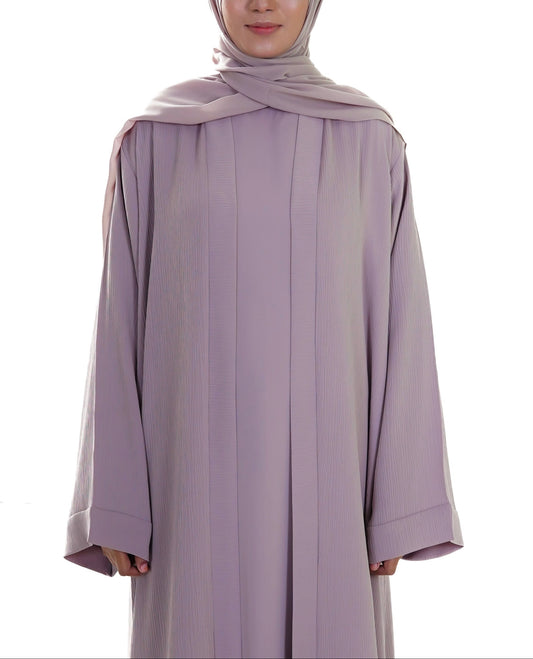 Muslim woman wearing Safiyyah 4 Piece Textured Open Abaya Set in Light Beige from Isra Niyyah Collection – elegant modestwear for everyday and occasion wear