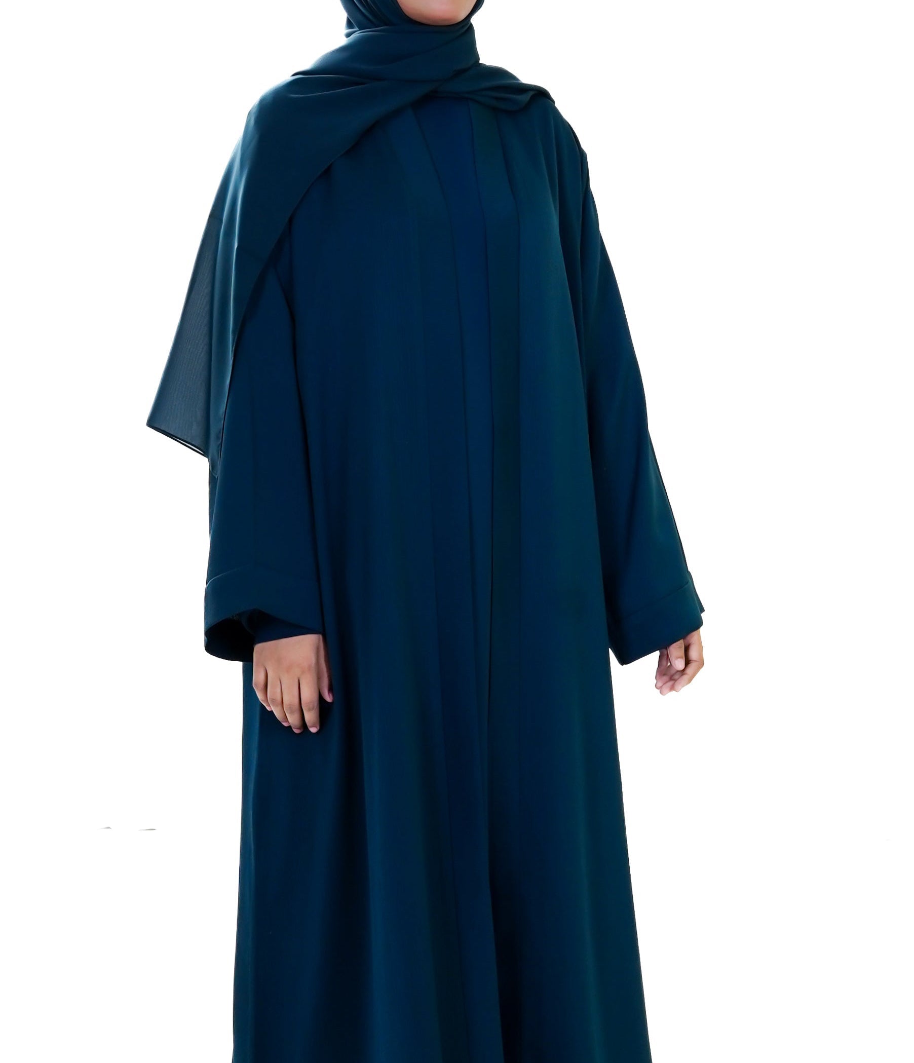 Person wearing a dark green abaya on a white background