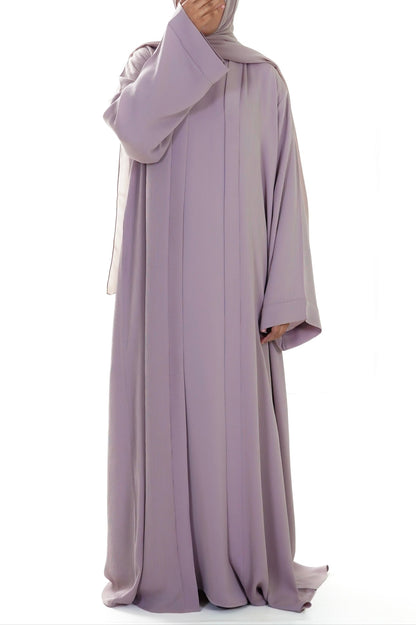 Muslim woman wearing Safiyyah 4 Piece Textured Open Abaya Set in Light Beige from Isra Niyyah Collection – elegant modestwear for everyday and occasion wear