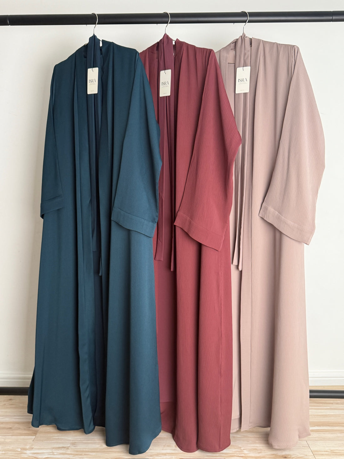 Muslim woman wearing Safiyyah 4 Piece Textured Open Abaya Set in Light Beige from Isra Niyyah Collection – elegant modestwear for everyday and occasion wear